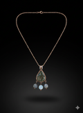 Copper pendant with labradorite and moon stones.